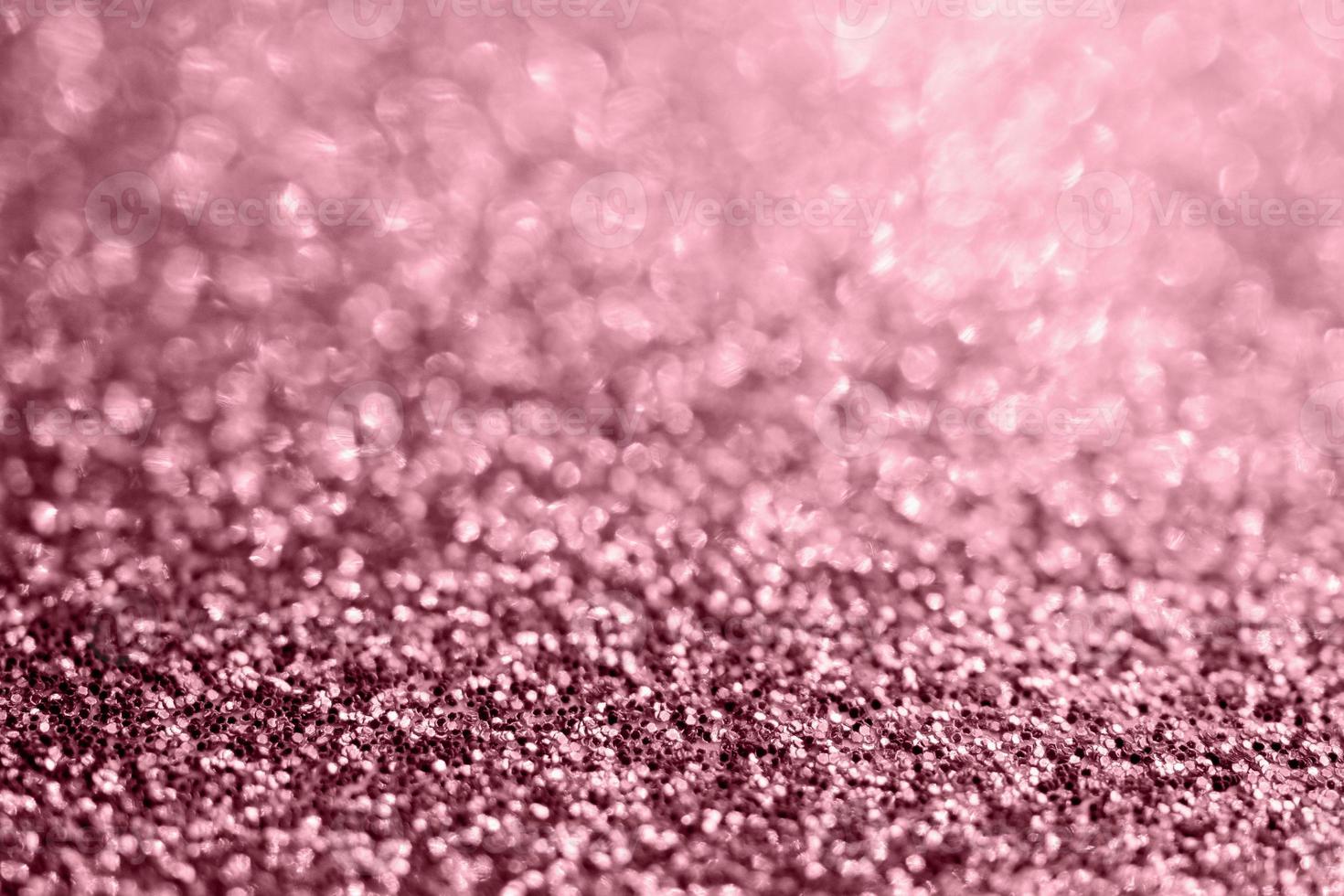 Abstract rose gold glitter sparkle texture with bokeh background photo