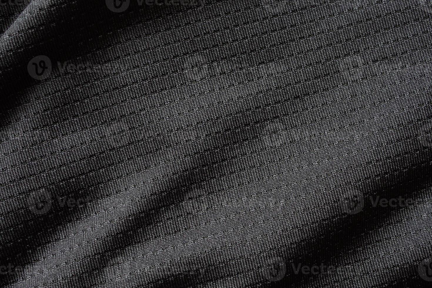 Black sport cloth fabric football shirt jersey texture close up photo