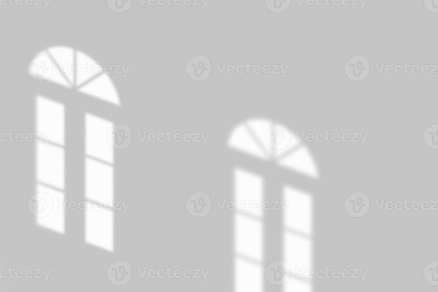 Window shadow drop on white wall background photo