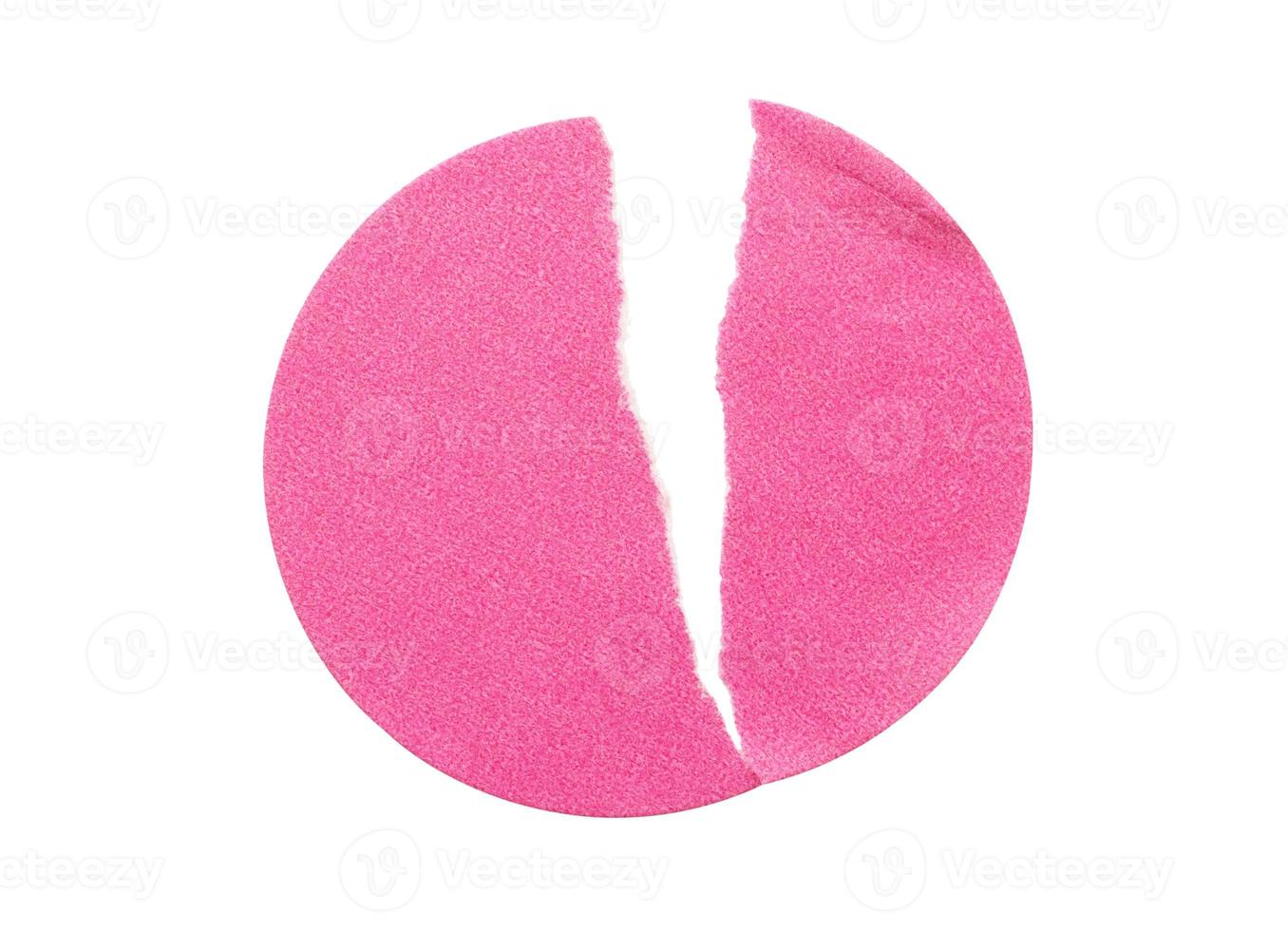 Blank pink round adhesive paper sticker label isolated on white background photo