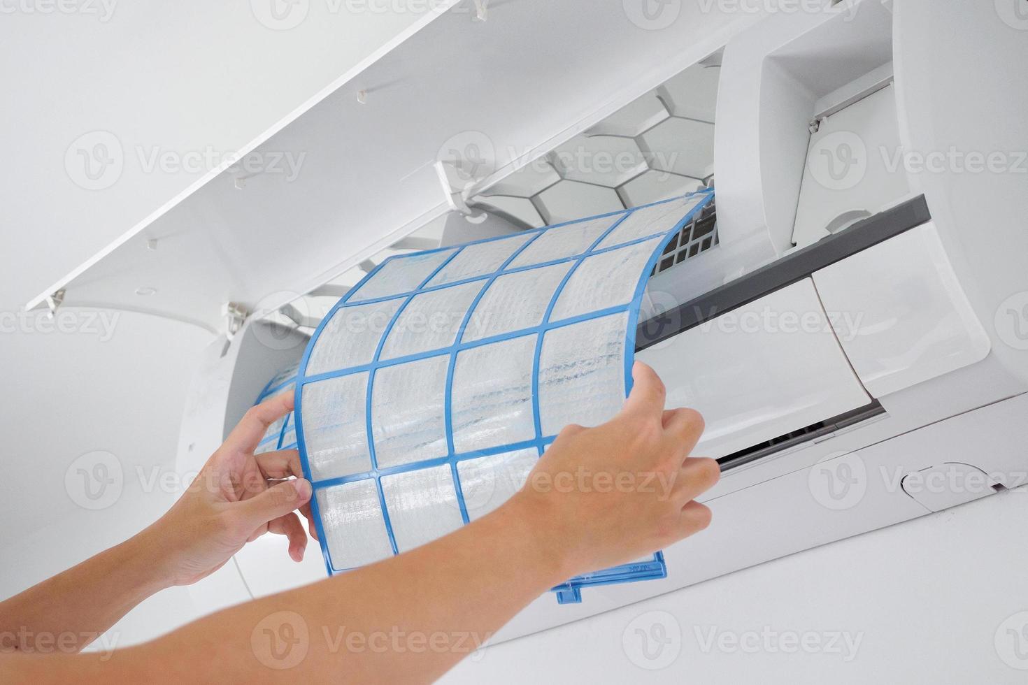 man hand hold air conditioner filter cleaning concept photo