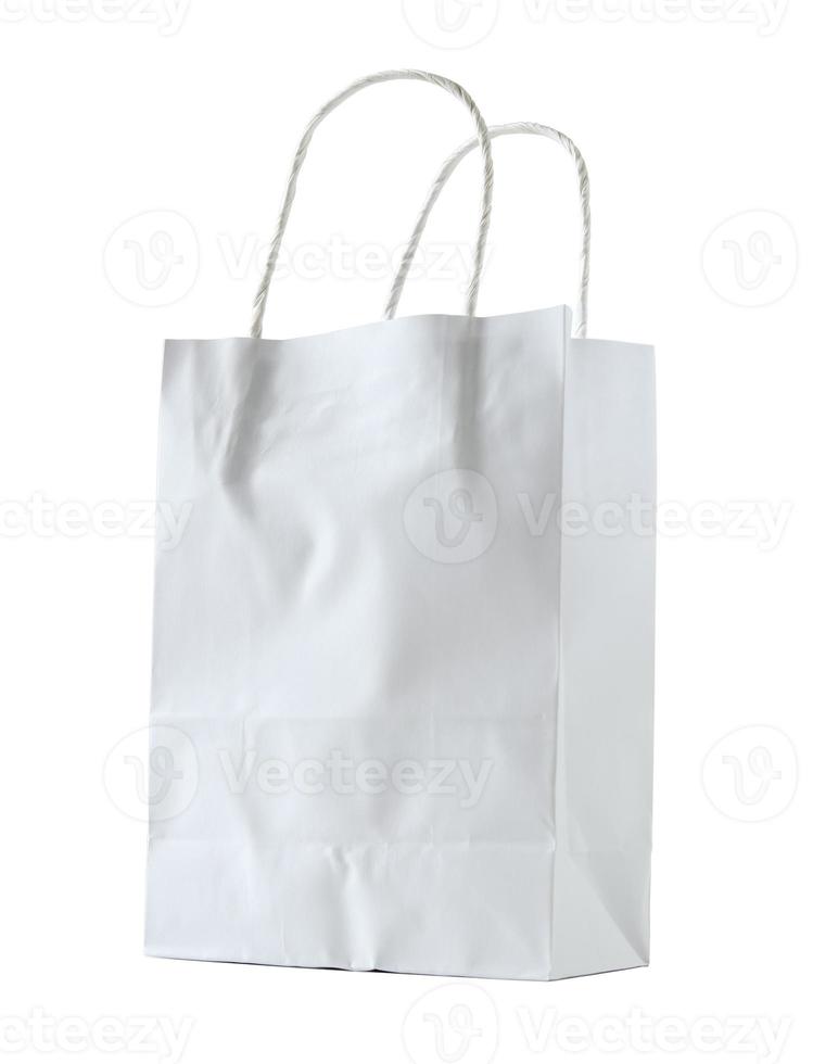 white paper bag isolated on white with clipping path photo