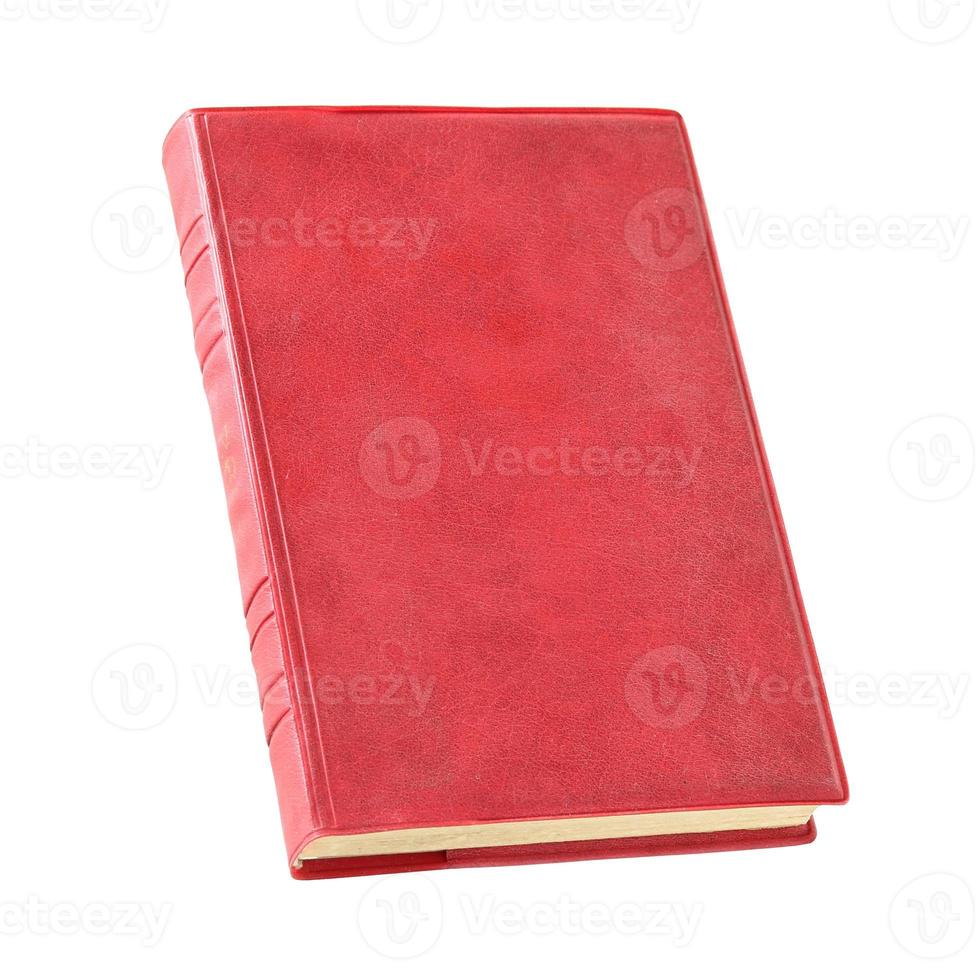 Old red book isolated over white with clipping path photo