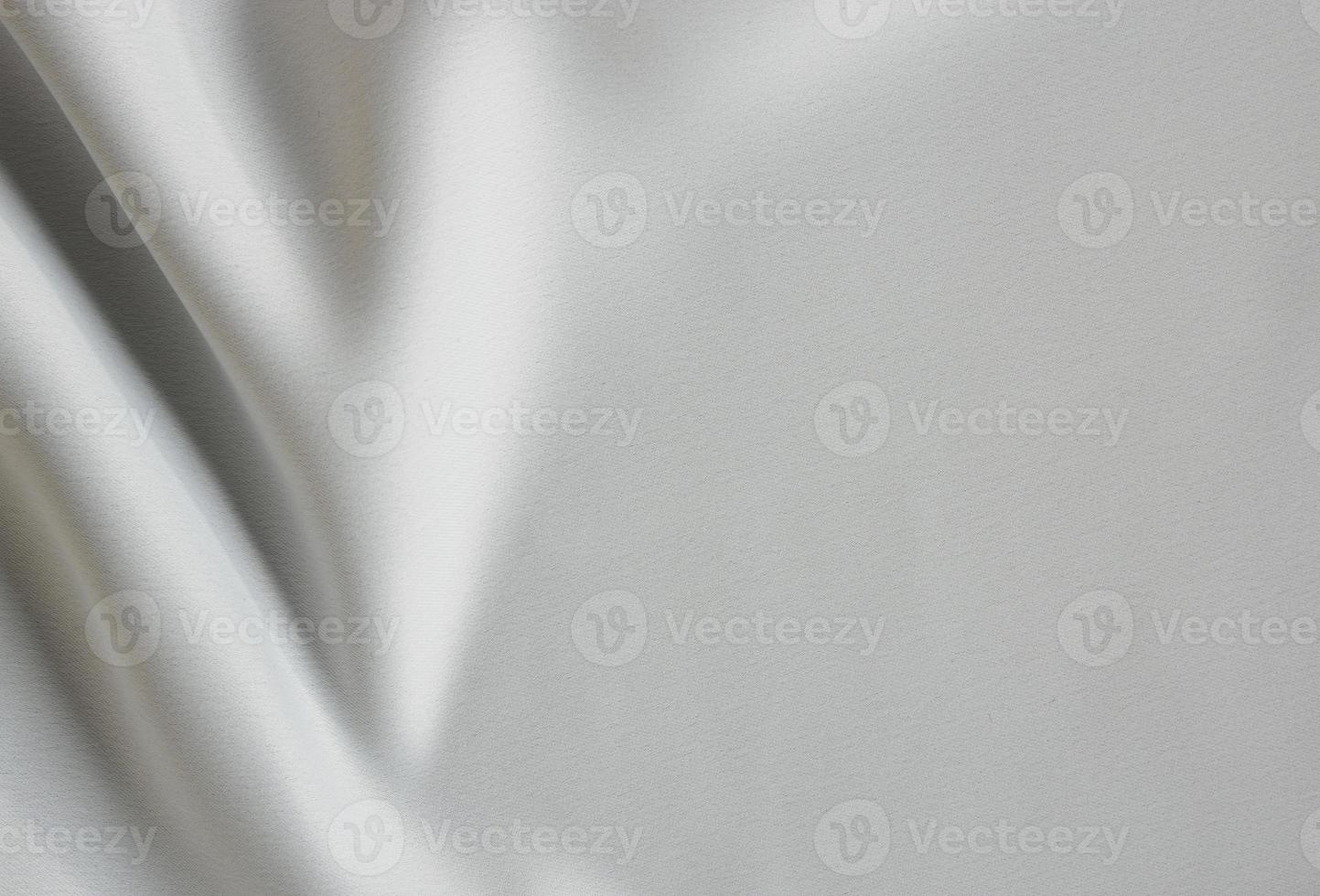 Grey wavy fabric texture for background photo