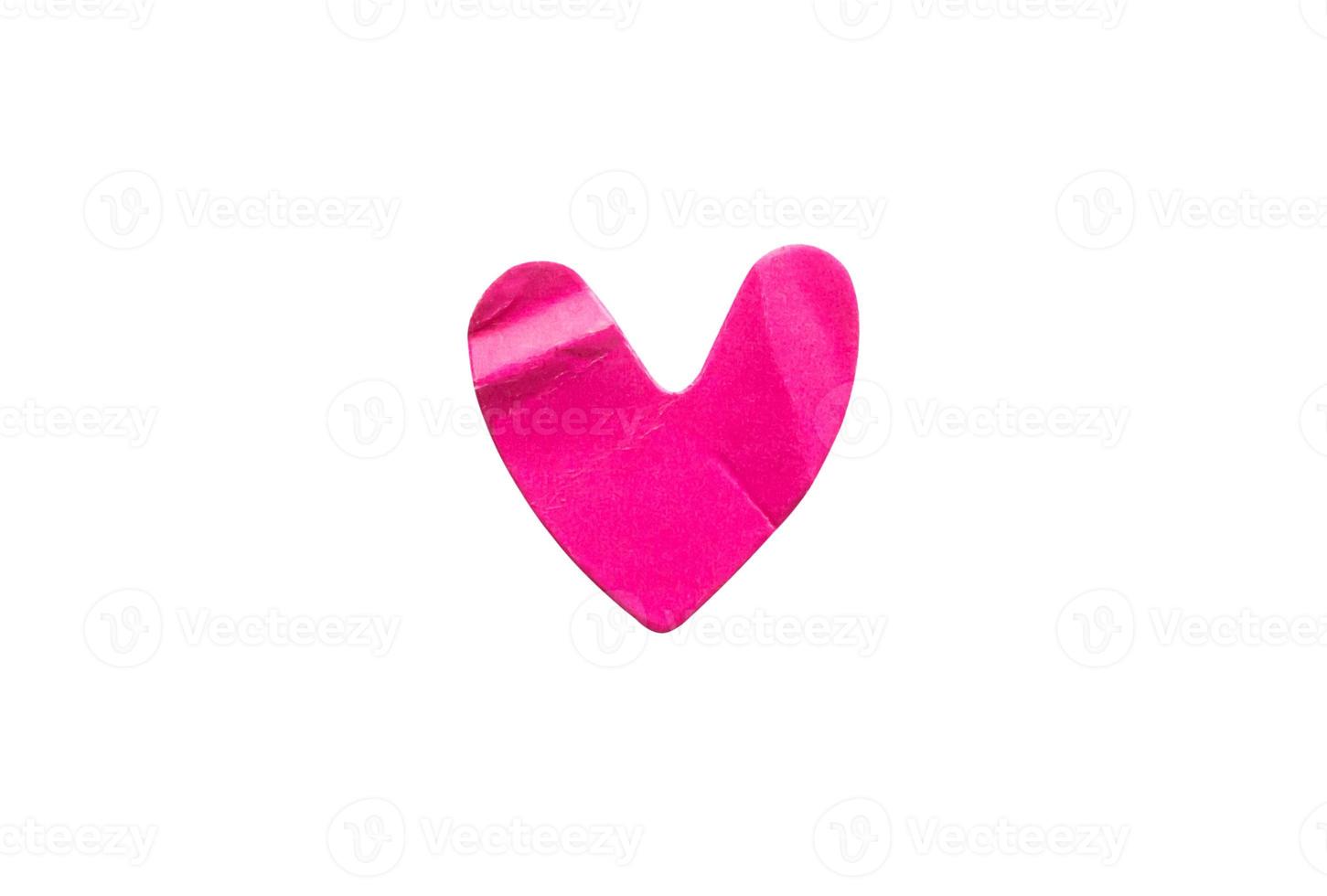 pink heart shape sticker isolated on white background photo