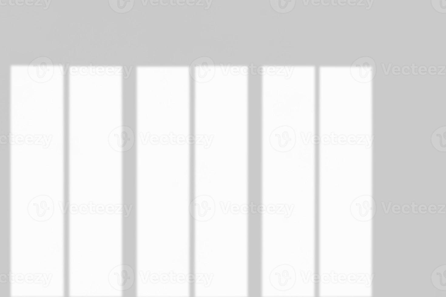 Window shadow drop on white wall background photo
