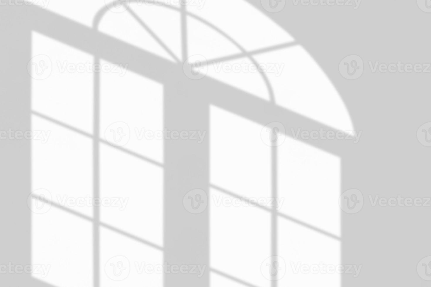 Window shadow drop on white wall background photo