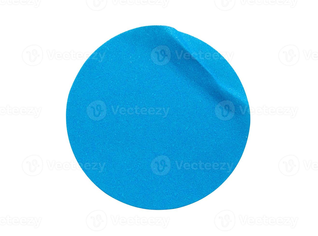 Blank blue round adhesive paper sticker label isolated on white background photo