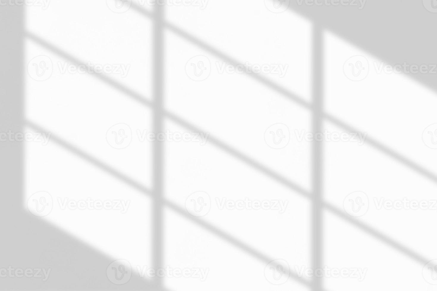 Window shadow drop on white wall background photo