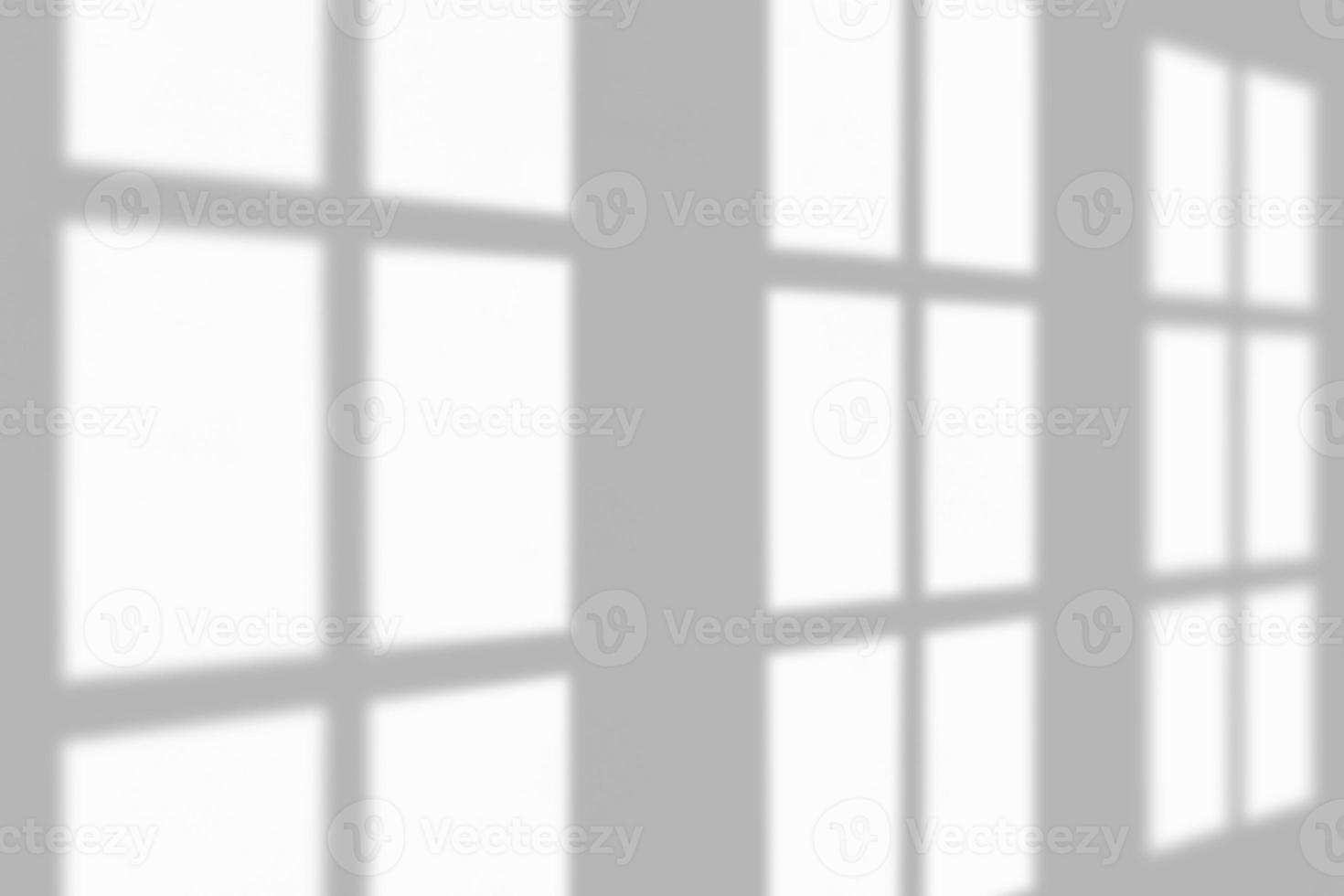 Window shadow drop on white wall background photo