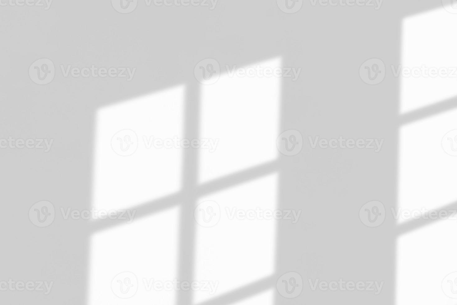 Window shadow drop on white wall background photo