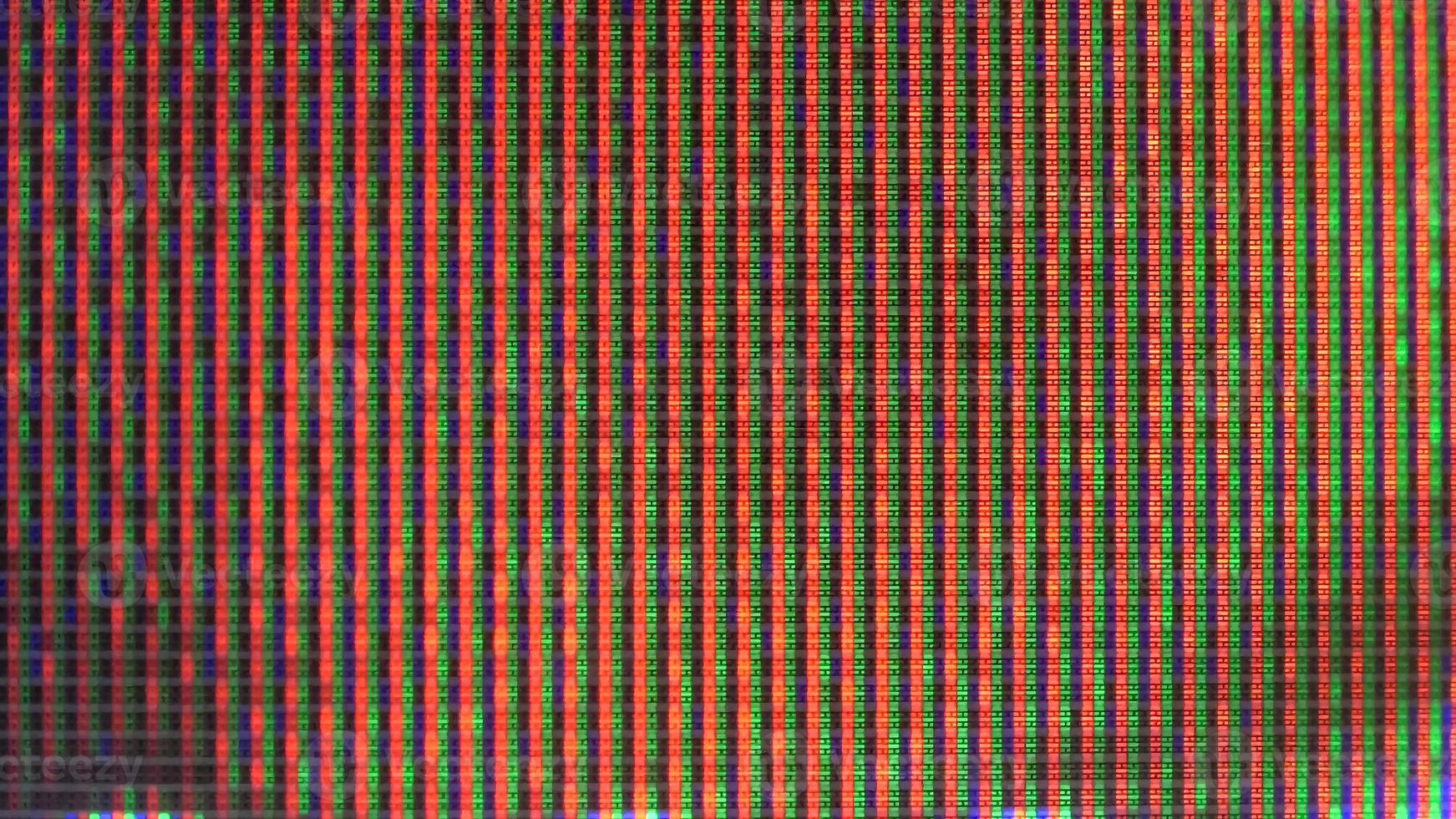 Close up view at a plasma tv while showing television activity. photo