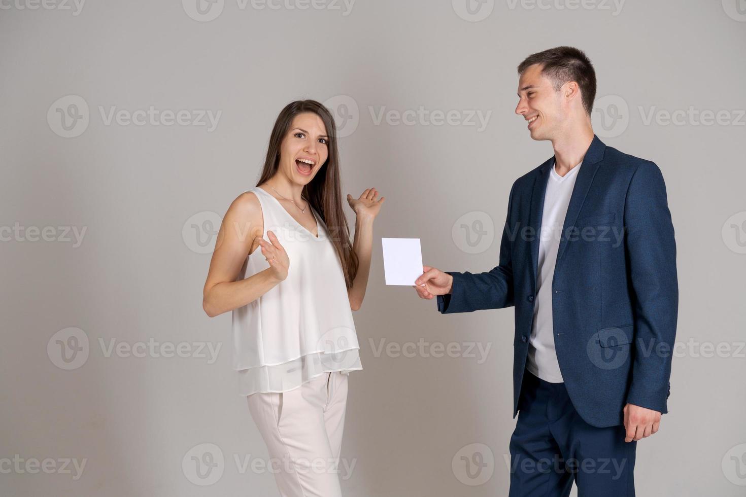 Business partners are happy to receive an important document. Man in blue suit photo