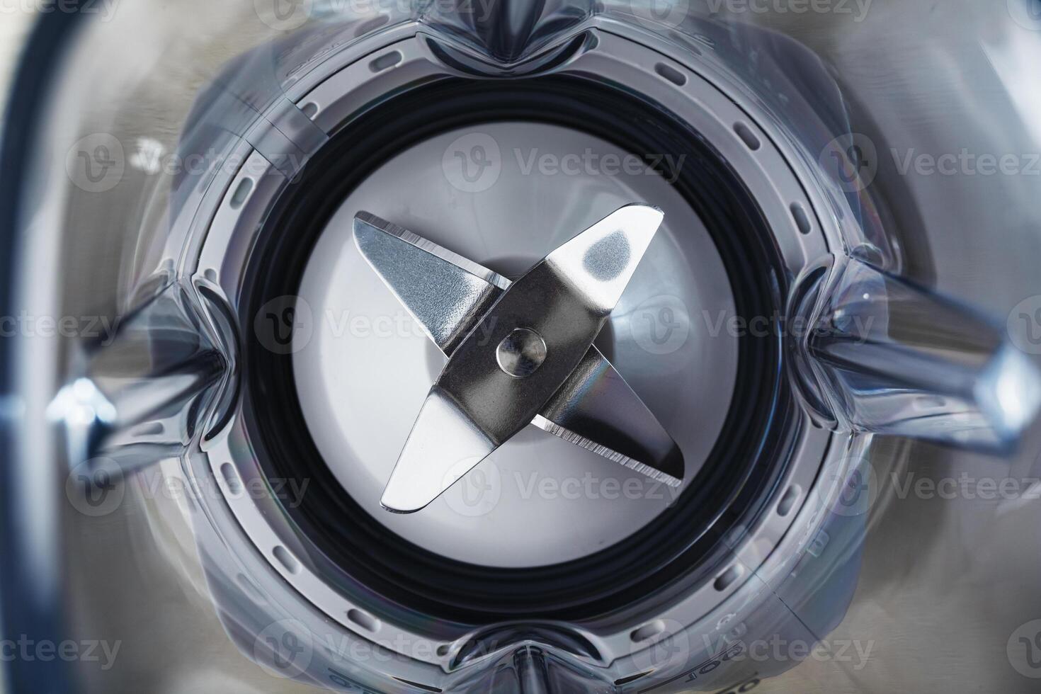 Empty Blender Bowl Top view with blades on black background. 12973634