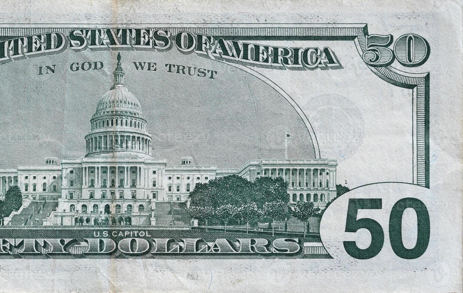 US Capitol on 50 dollars banknote back side closeup macro fragment. United states fifty dollars money bill photo