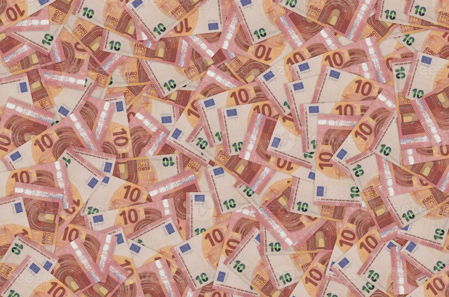 Pattern part of 10 euro banknote close-up with small red details photo