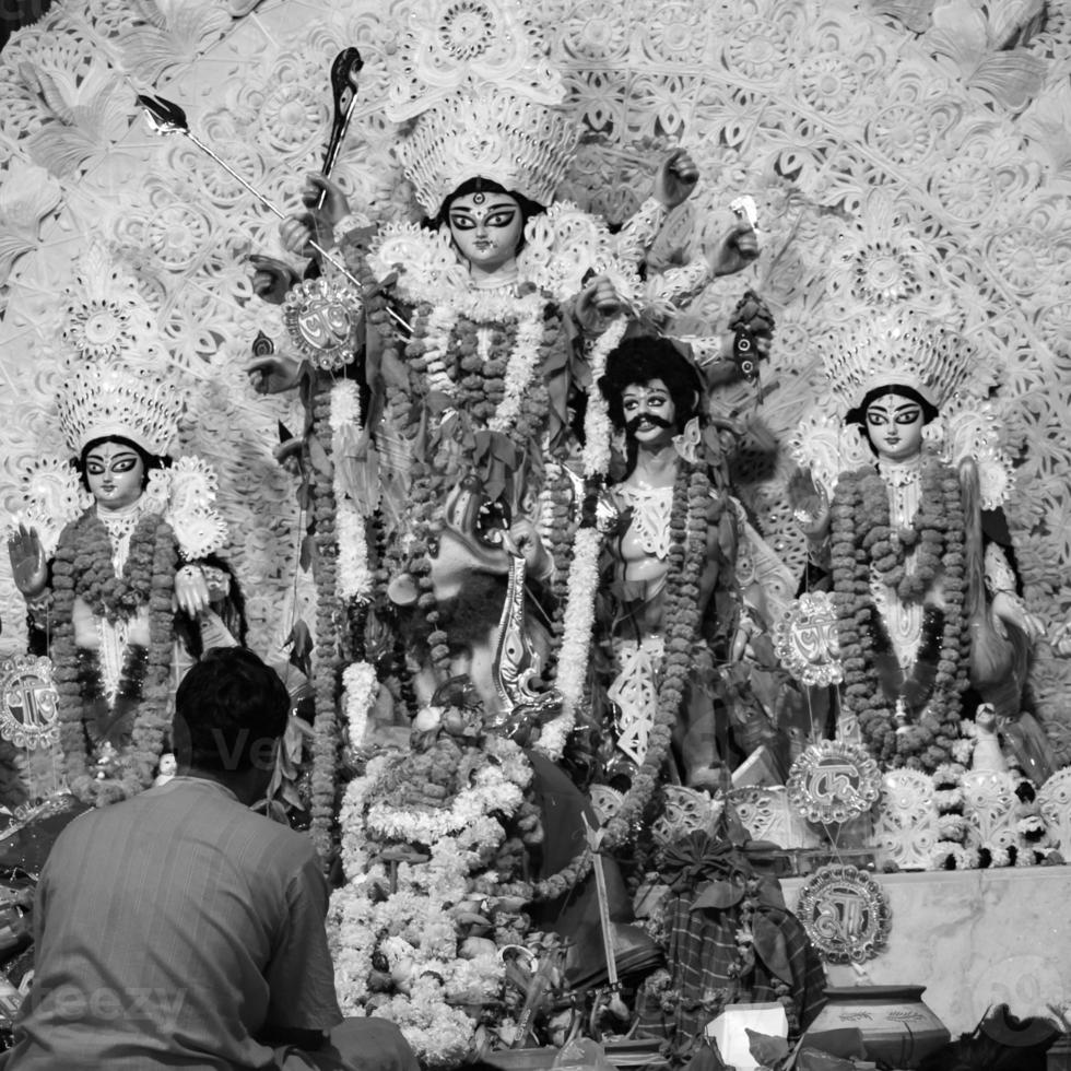 Goddess Durga with traditional look in close up view at a South Kolkata Durga Puja, Durga Puja Idol, A biggest Hindu Navratri festival in India Black and White photo