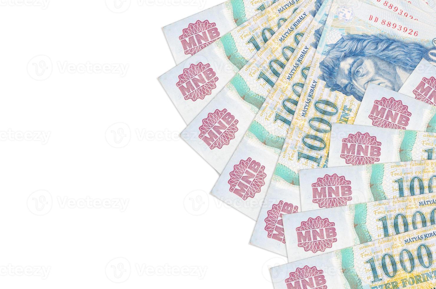 1000 Hungarian forint bills lies isolated on white background with copy space. Rich life conceptual background photo