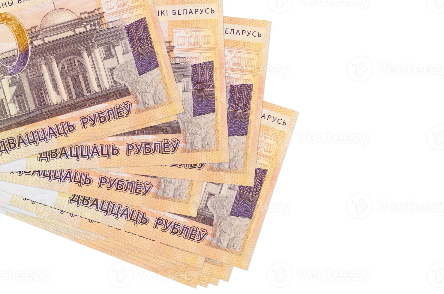 20 Belorussian rubles bills lies in small bunch or pack isolated on white. Mockup with copy space. Business and currency exchange photo