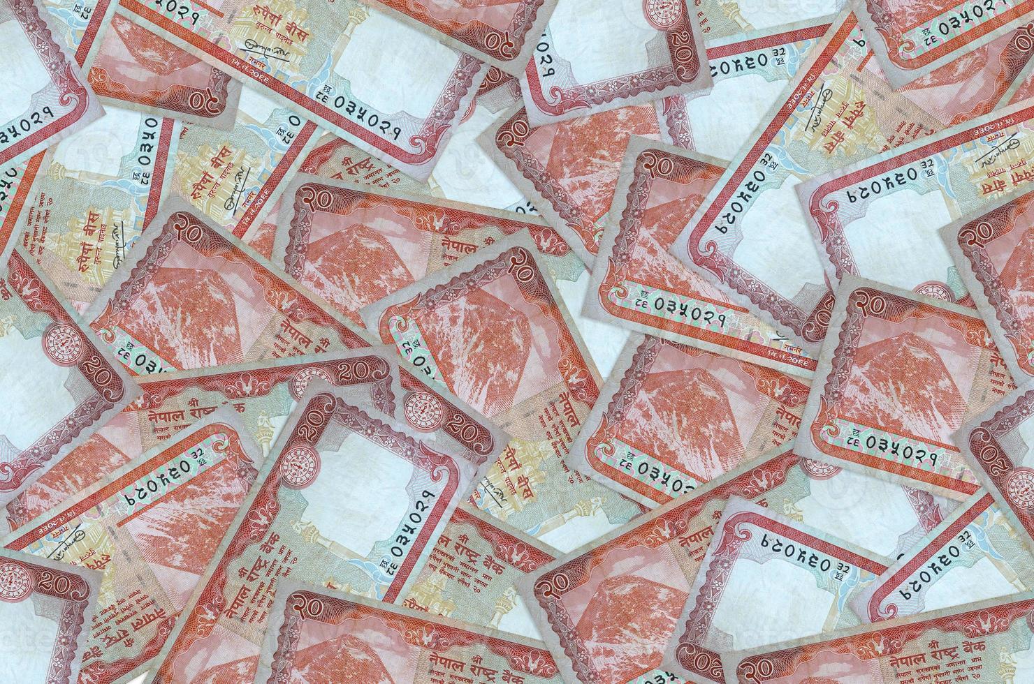 20 Nepalese rupees bills lies in big pile. Rich life conceptual background photo