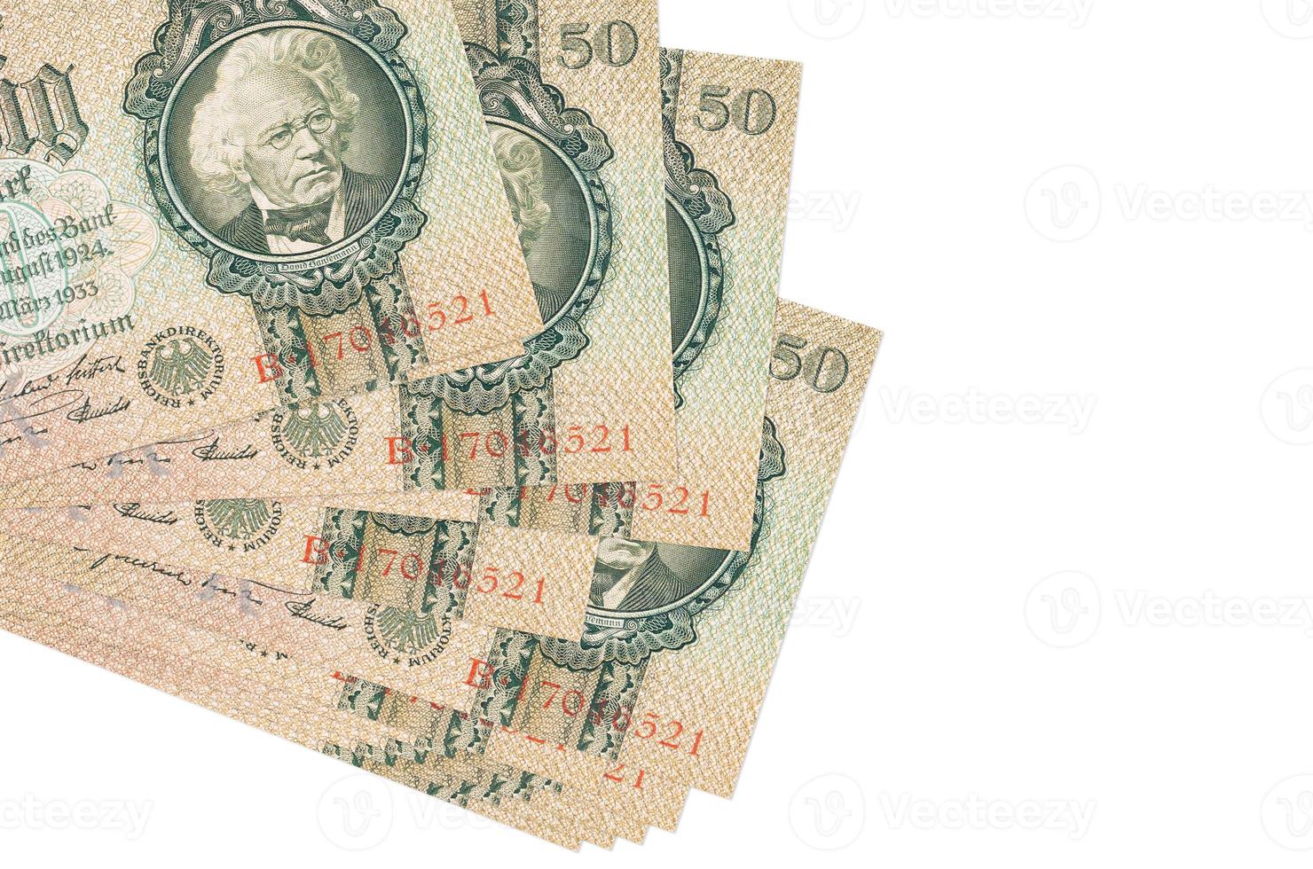 50 Reich marks bills lies in small bunch or pack isolated on white. Mockup with copy space. Business and currency exchange photo