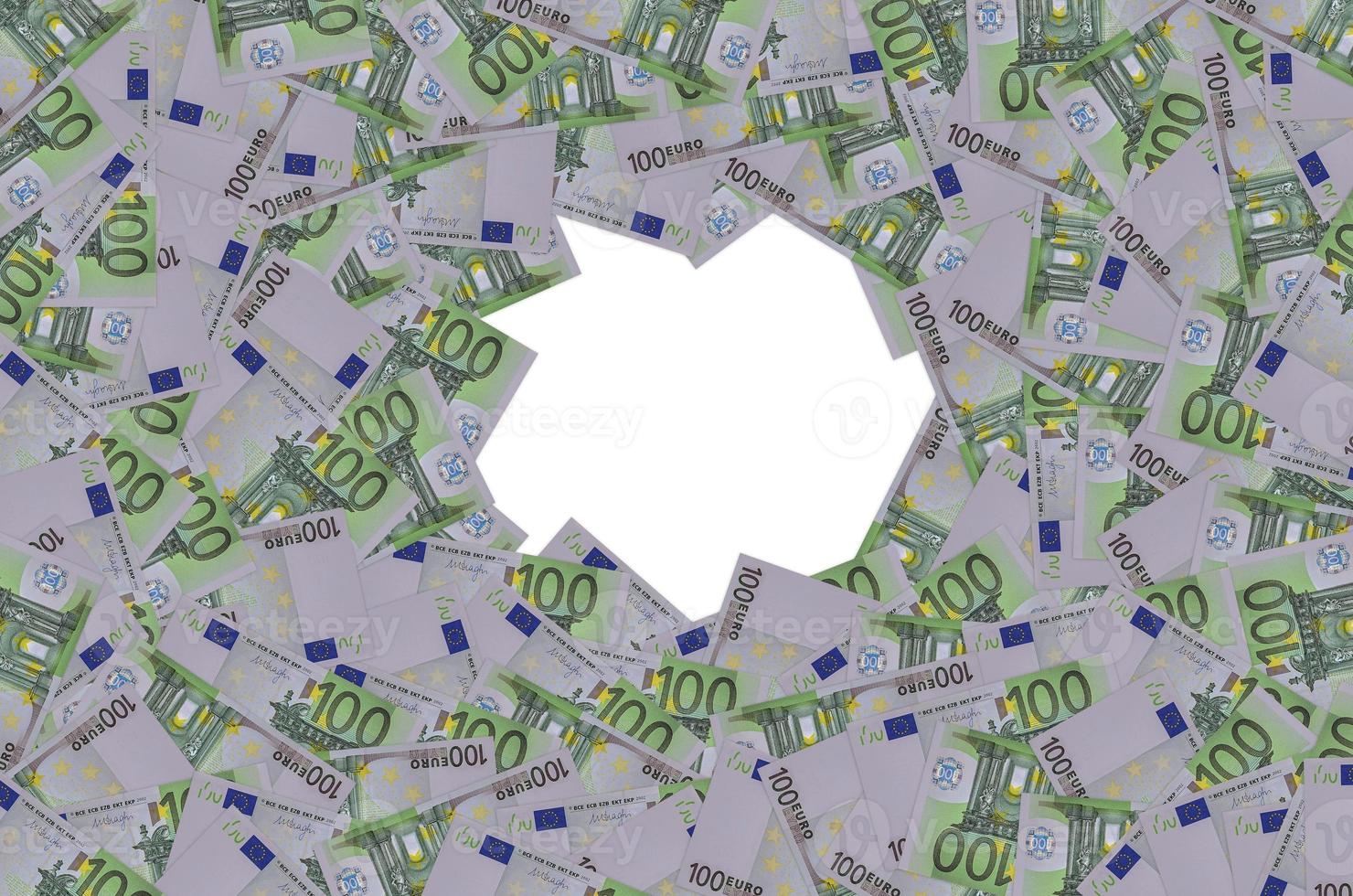 Front part of 100 euro banknote close-up with small green details photo