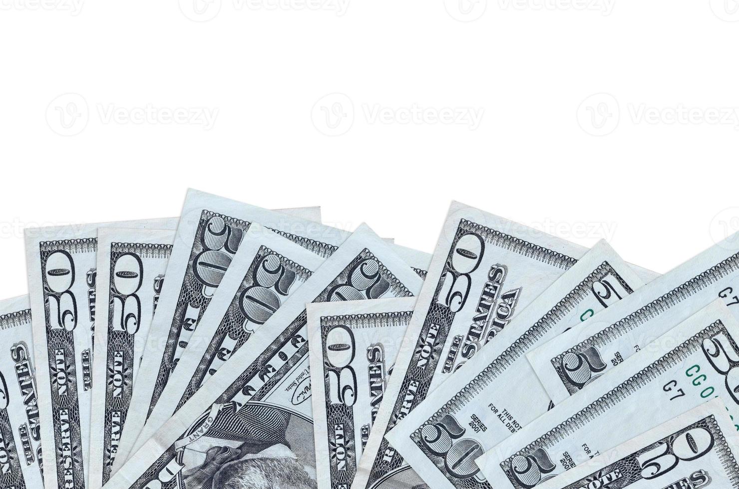 50 US dollars bills lies on bottom side of screen isolated on white background with copy space. Background banner template photo