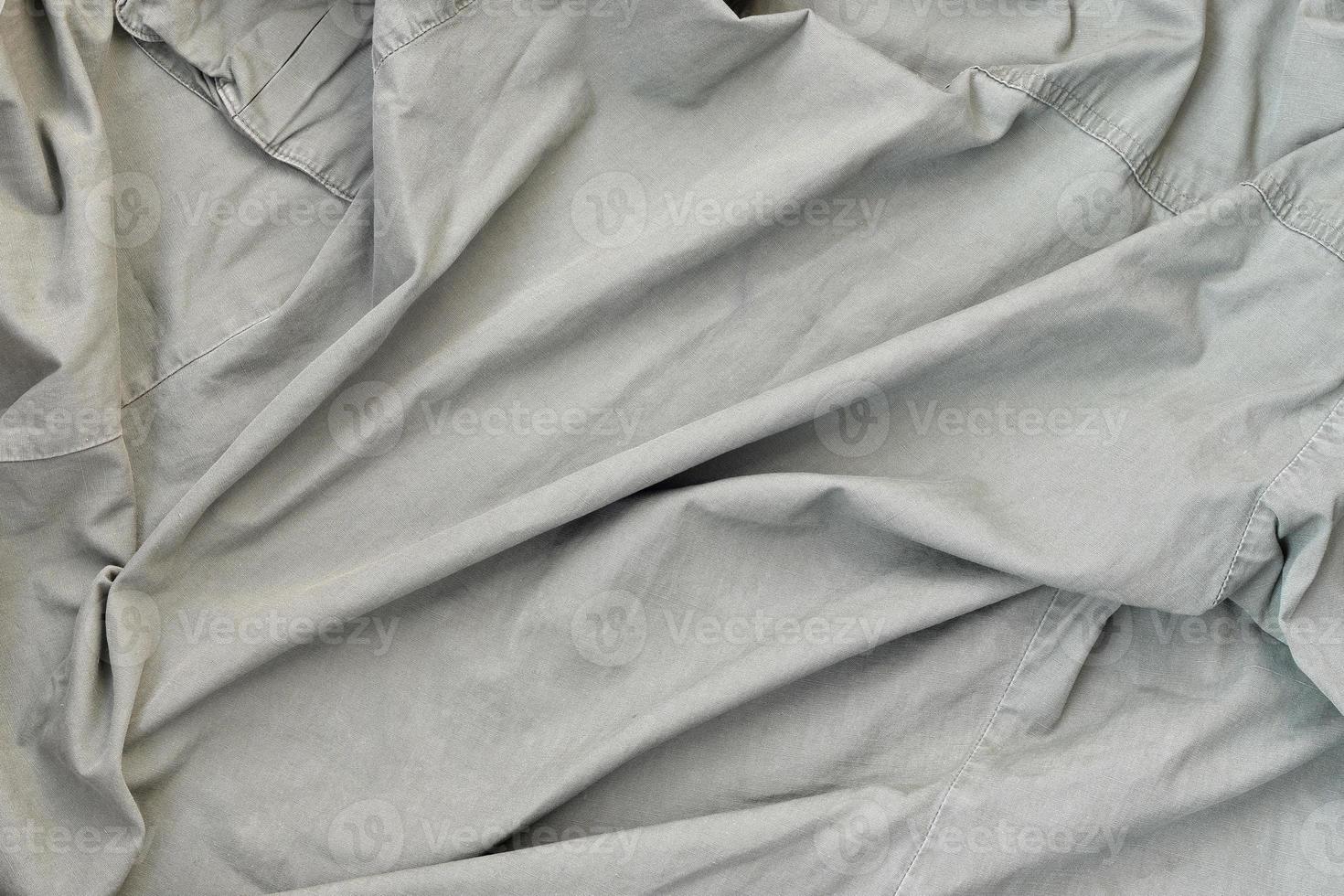The texture of the fabric is olive-colored, which is similar to the uniform of American soldiers of the Second World War photo