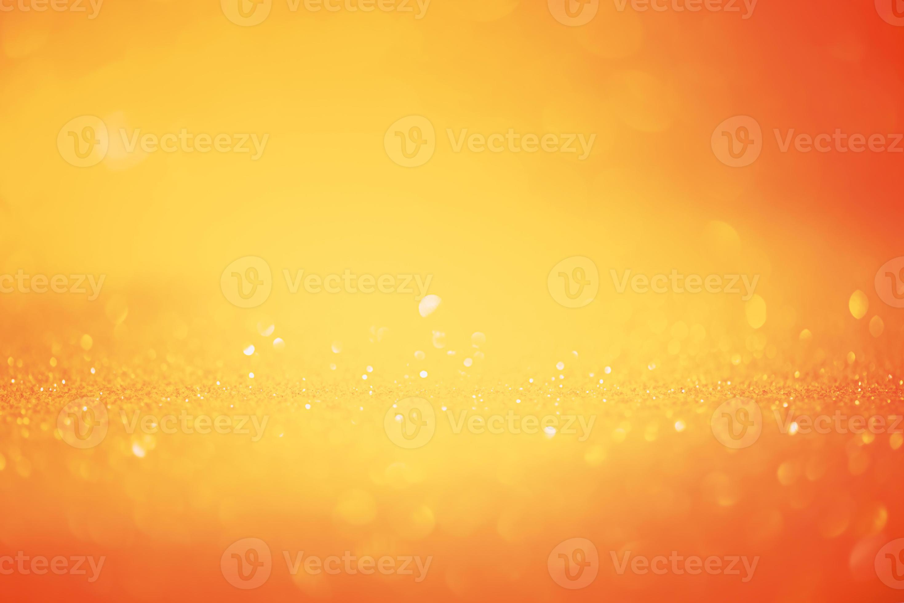 Orange glitter background defocused and narrow focal part. Material for