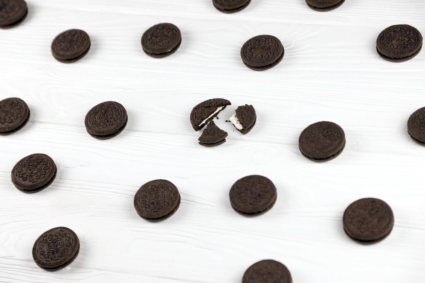 Oreo sandwich cookies on white table. Oreo is a sandwich cookie with a sweet cream is the best selling cookie in the US photo
