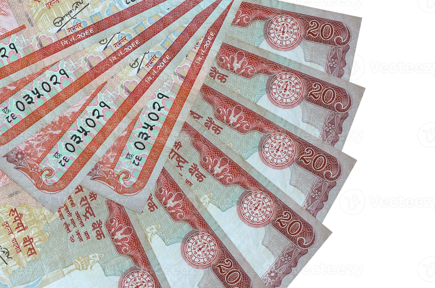 20 Nepalese rupees bills lies isolated on white background with copy space stacked in fan shape close up photo