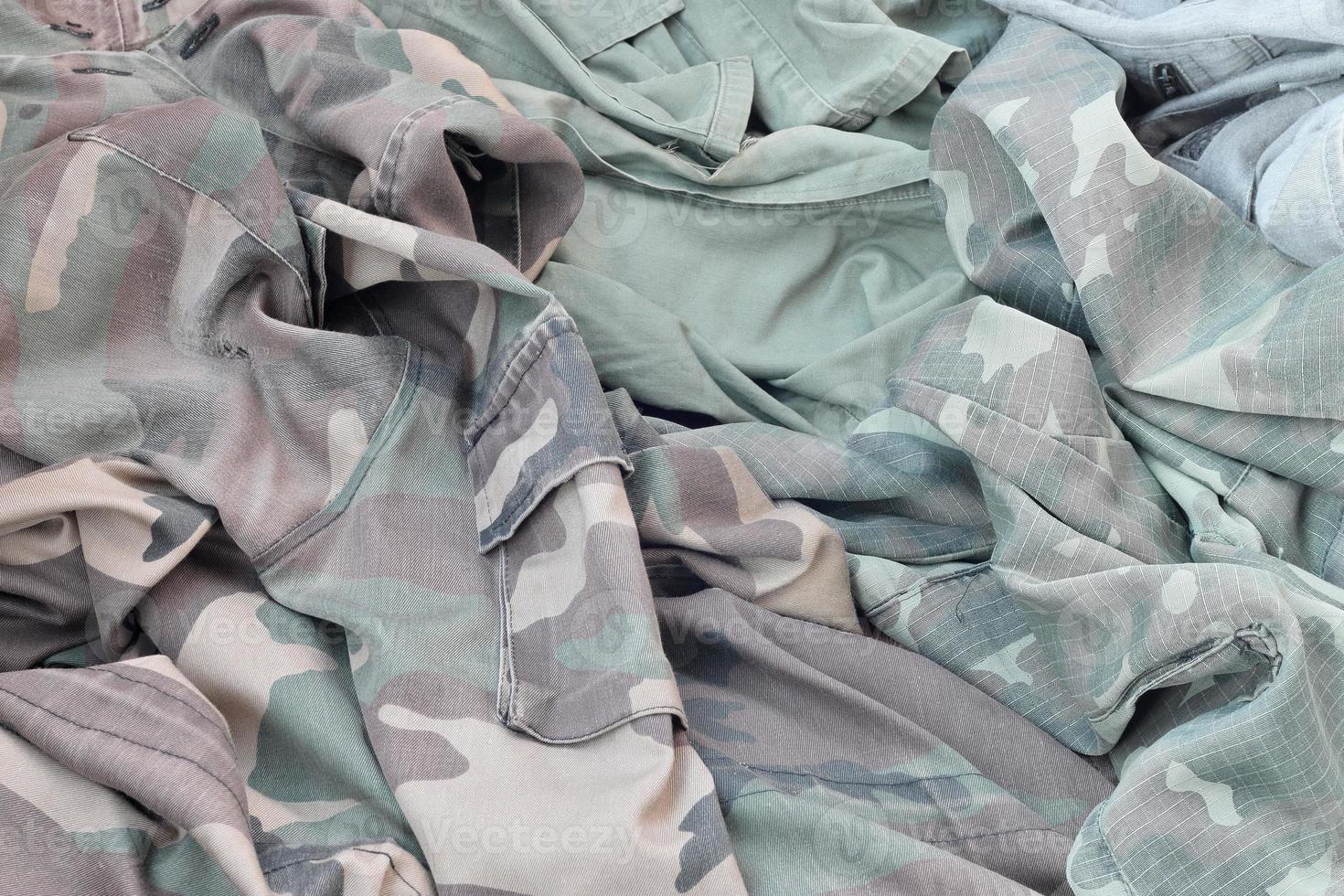 Camouflage background texture as backdrop for stalking and Chernobyl exclusion zone design projects photo