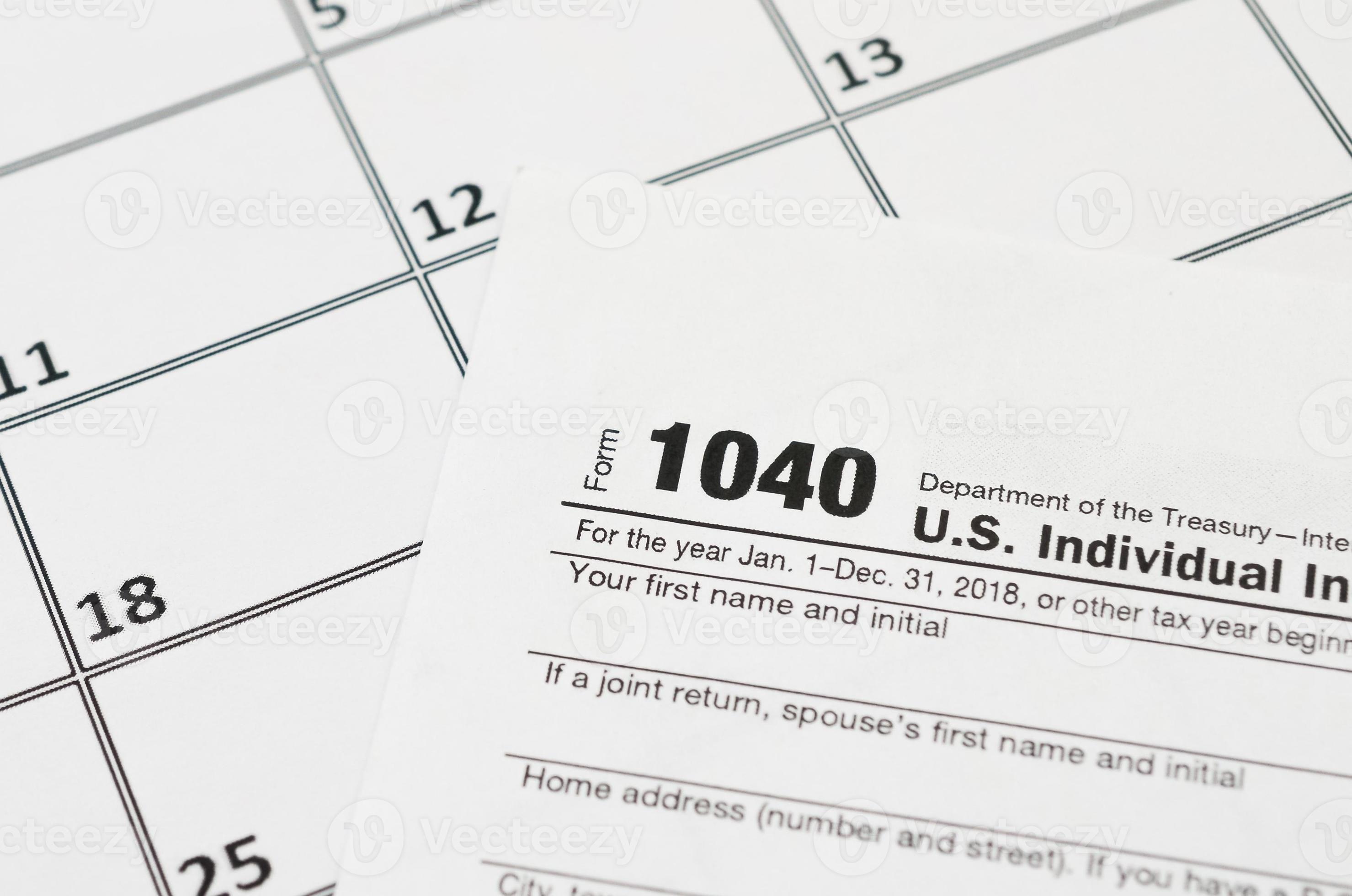 irs form 1040 individual income tax return blank lies on empty