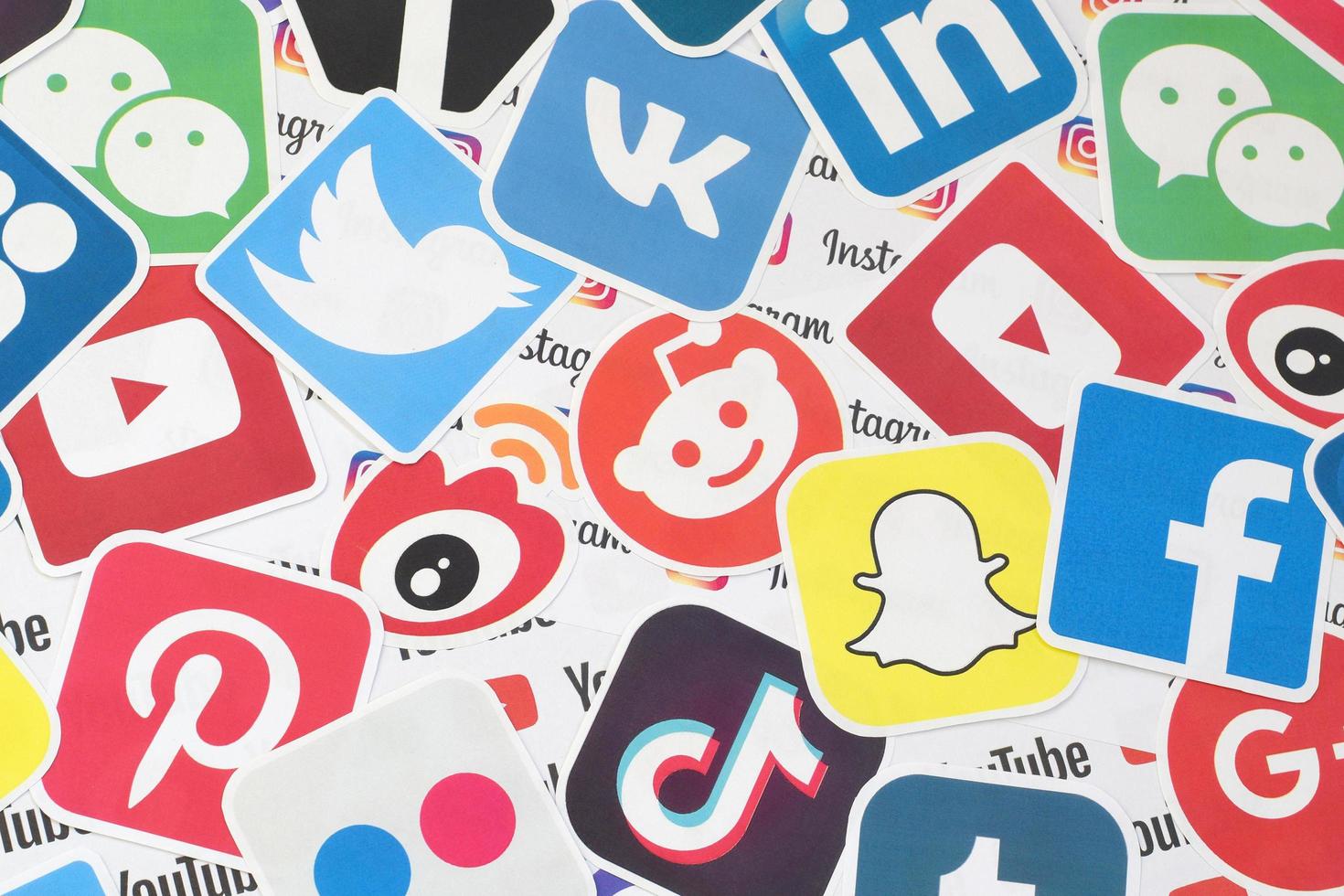 Many paper logos of popular social networks and internet resources. Colorful banner photo