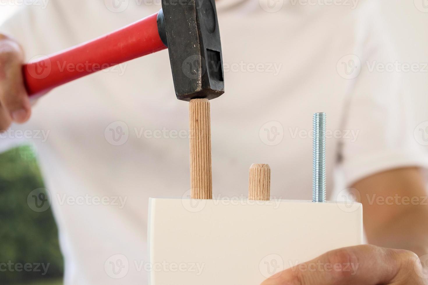 Man assembling furniture at home photo
