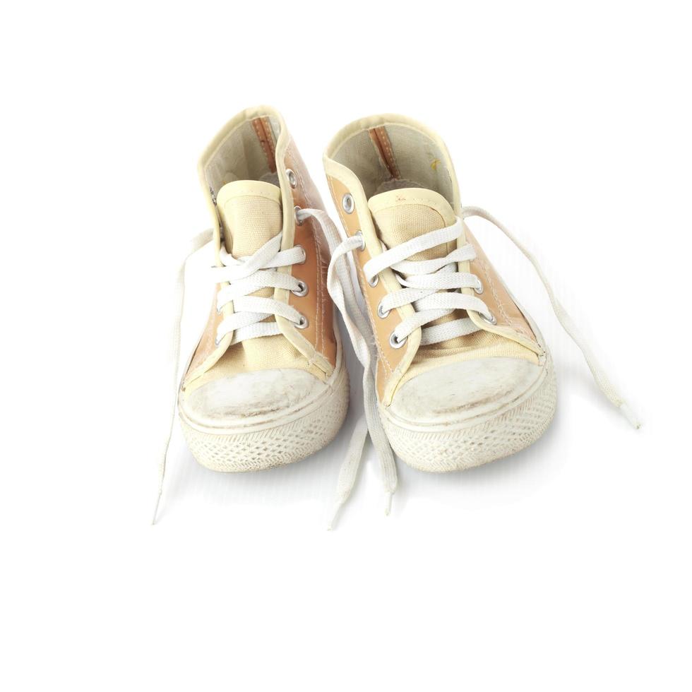 zapatos de niño aislar en blanco foto