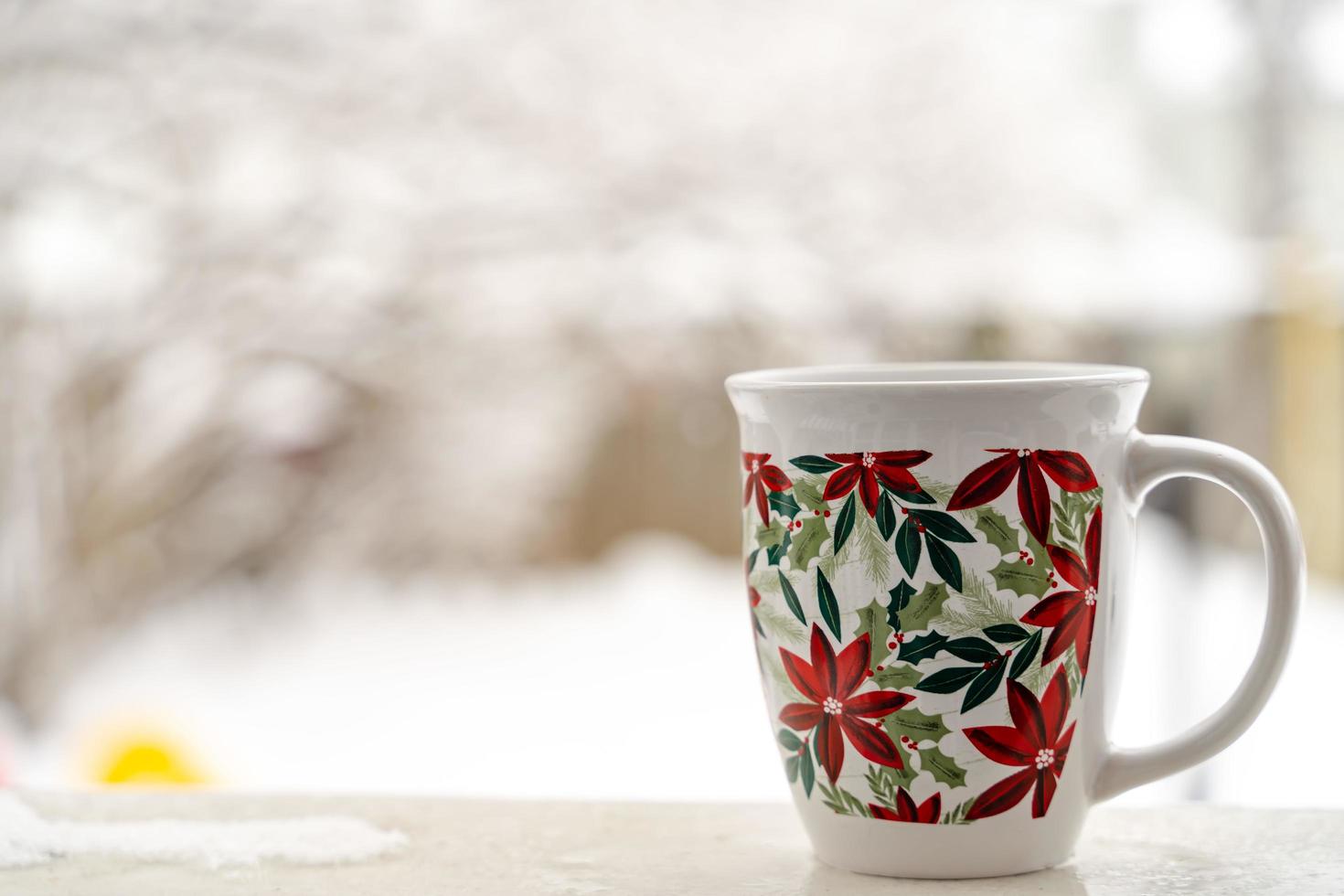 relaxing and drinking coffee or tea,The cups of coffee on a snow day, on balcony. relaxation concept. blurred background of beautiful . photo