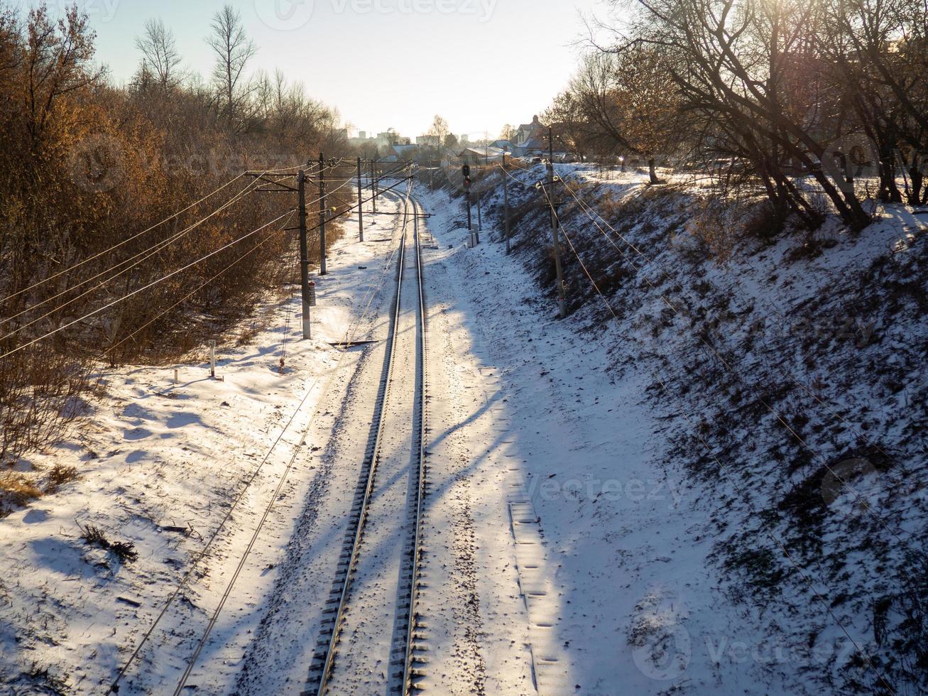 Railroad tracks in the snow. Train track. photo