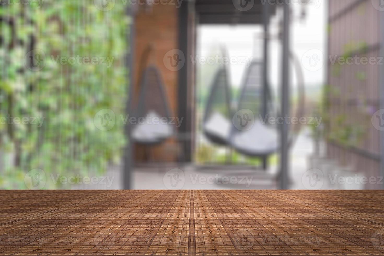 Top desk with blur living room background,wooden table photo
