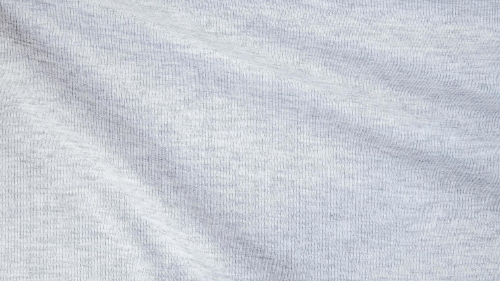 High resolution, detail shot of soft white gray jersey fabric background. Polyester and cotton clothing wallpaper with copy space for text. photo