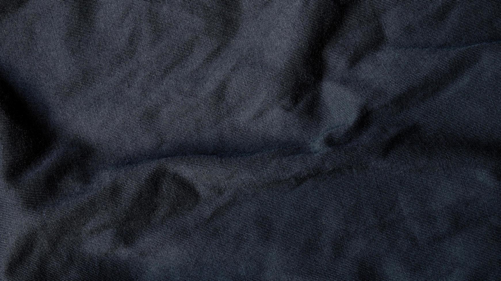 High resolution, detail shot of soft Black gray fabric background. Polyester and cotton clothing wallpaper with copy space for text. photo