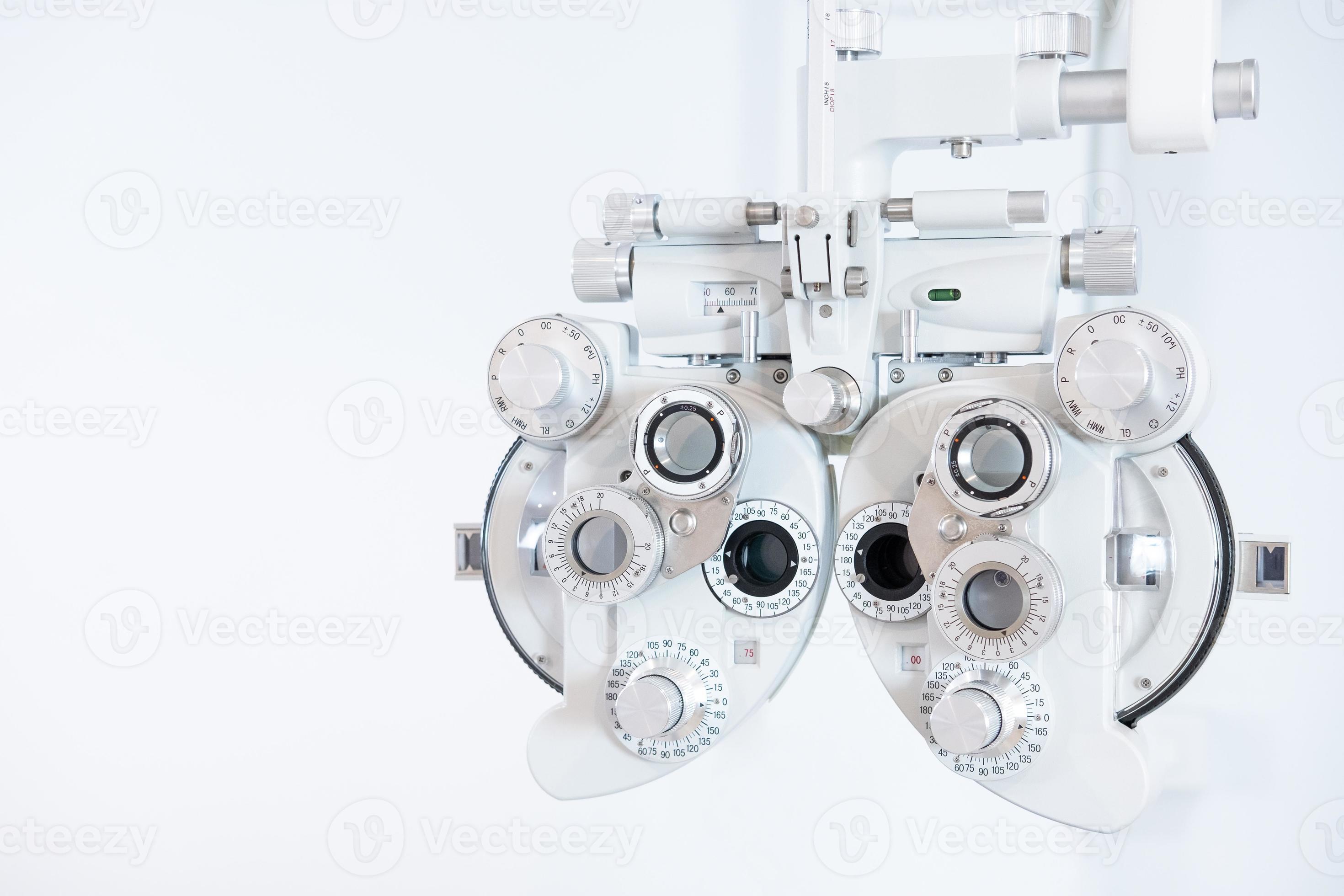 Selective focus at Optometry frame equipment. With blurred white
