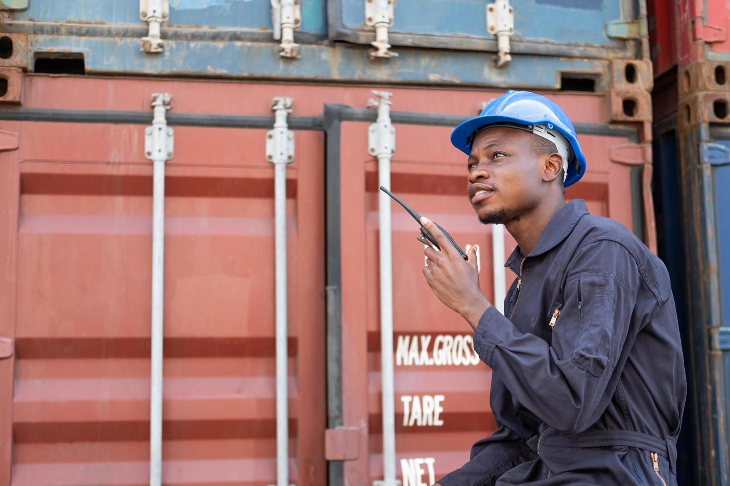 Selective focus at face of Black African logistic worker wearing safety