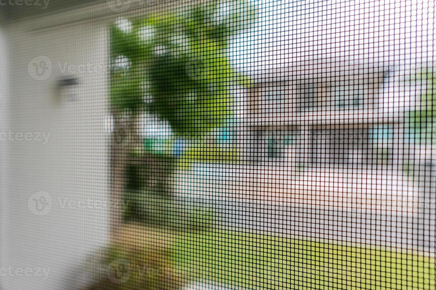mosquito net wire screen on house window protection against insect photo