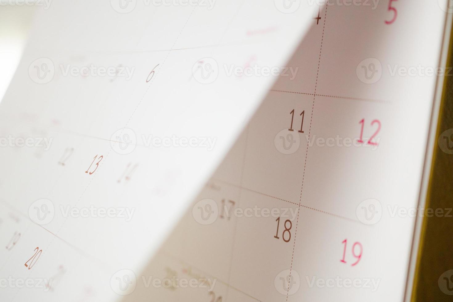 Abstract blur calendar page flipping sheet close up background business schedule planning appointment meeting concept photo