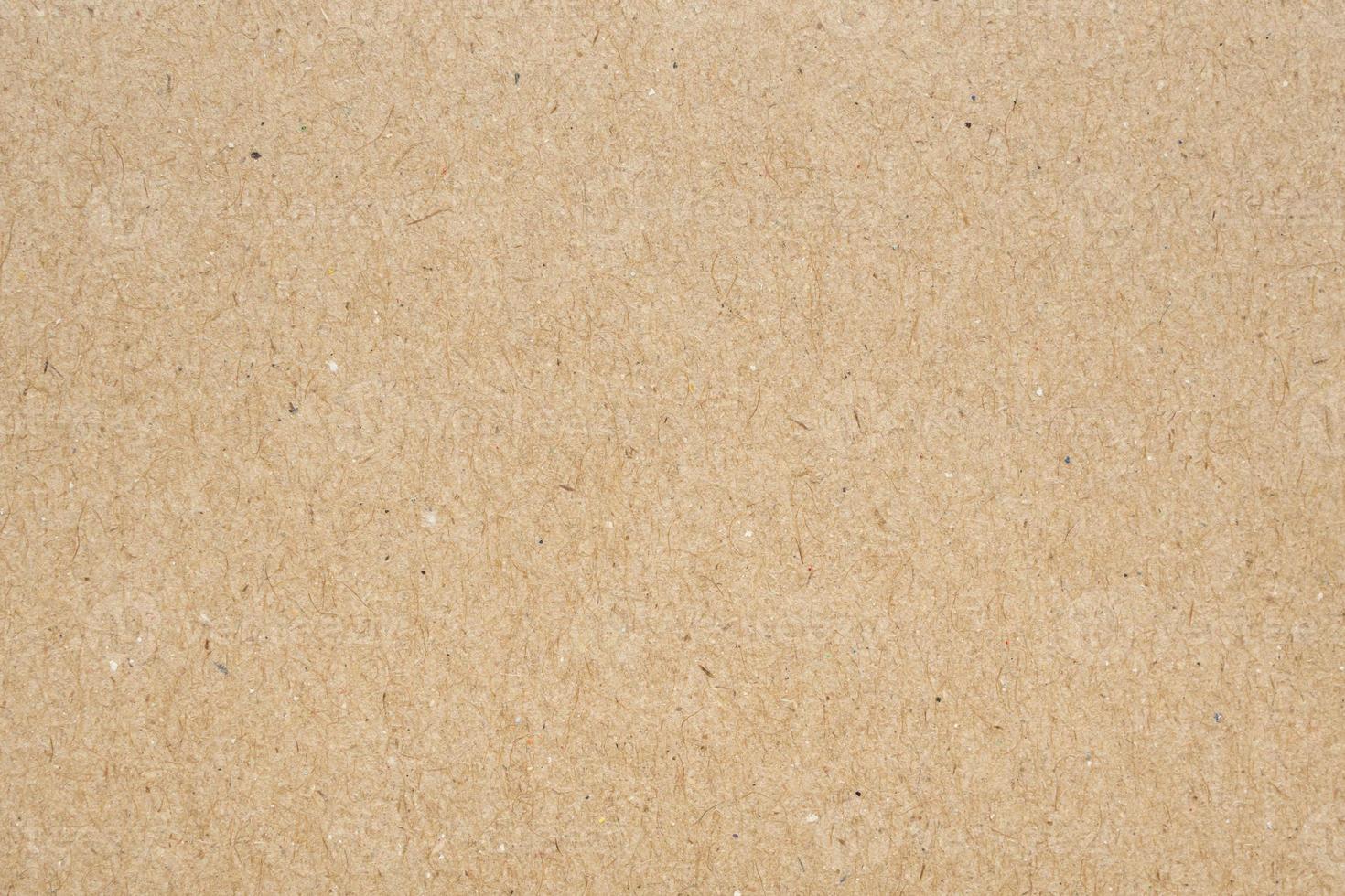 Fondo de textura de papel kraft reciclado marrón 13002216 Foto de stock en  Vecteezy