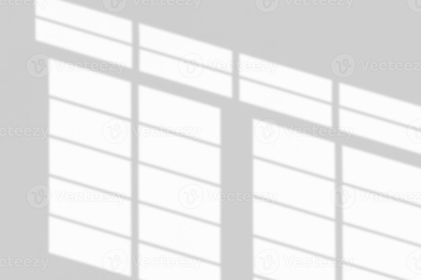 Window shadow drop on white wall background photo