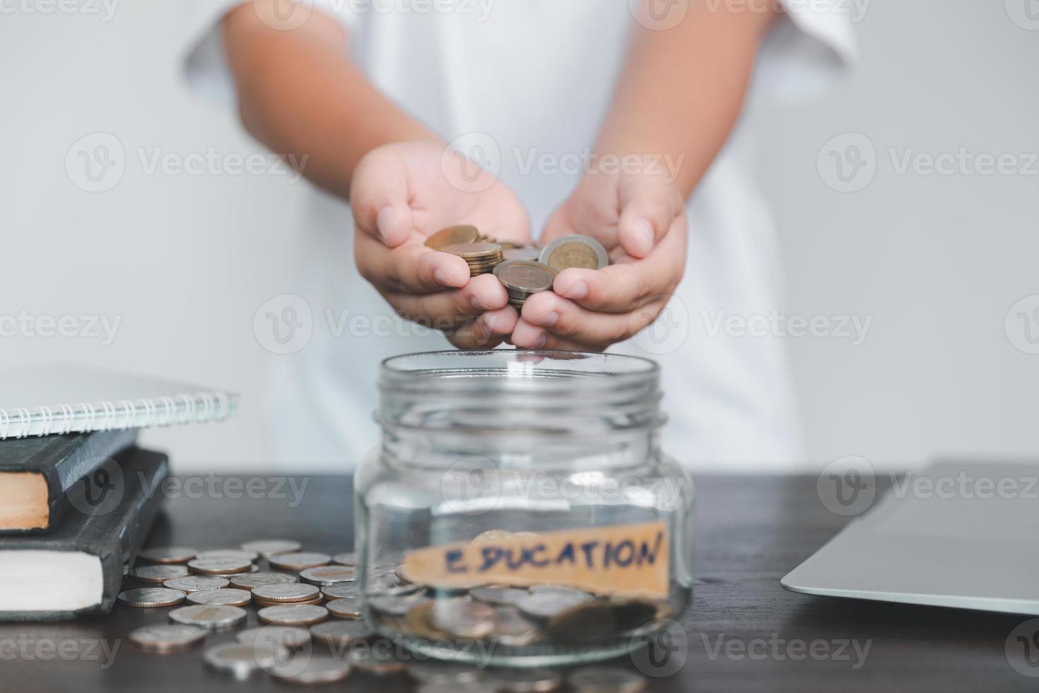 Saving money coin with banking investment, finance education concept. Planning student loan for studying abroad for college or university degree. Future children's education fund cash. Growing saving photo