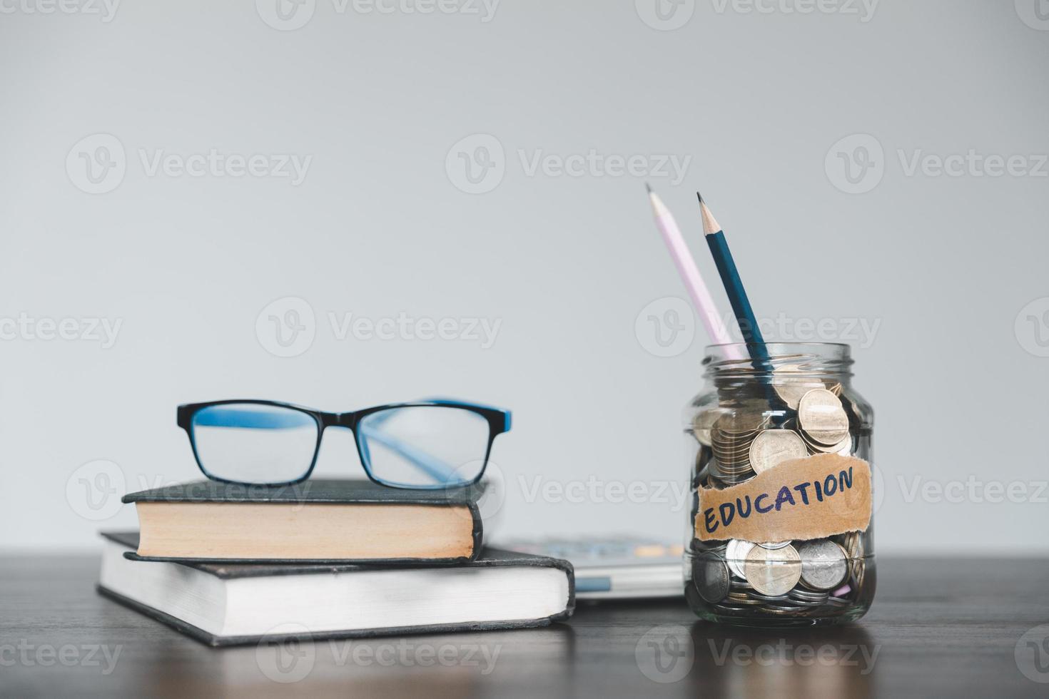 Saving money coin with banking investment, finance education concept. Planning student loan for studying abroad for college or university degree. Future children's education fund cash. Growing saving photo