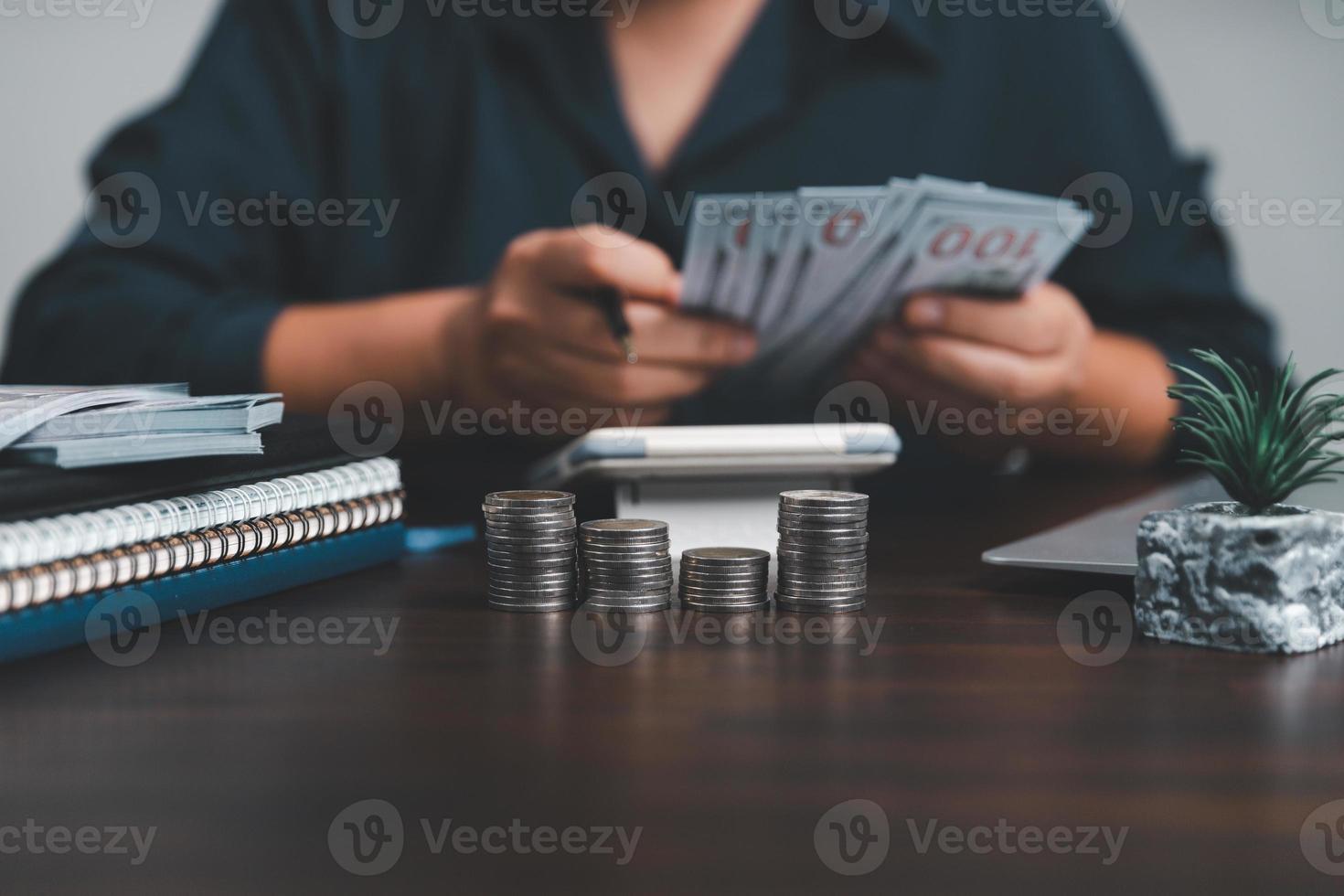 Saving investment banking finance concept. Stack of coins with piggy bank on the table. Growth of loan and investment business idea. Asset Management, Funds, Liabilities, Deposits, Income, Successful. photo